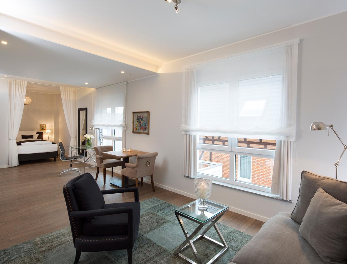 Logis First Class Business Suites Renningen Pokoj fotografie